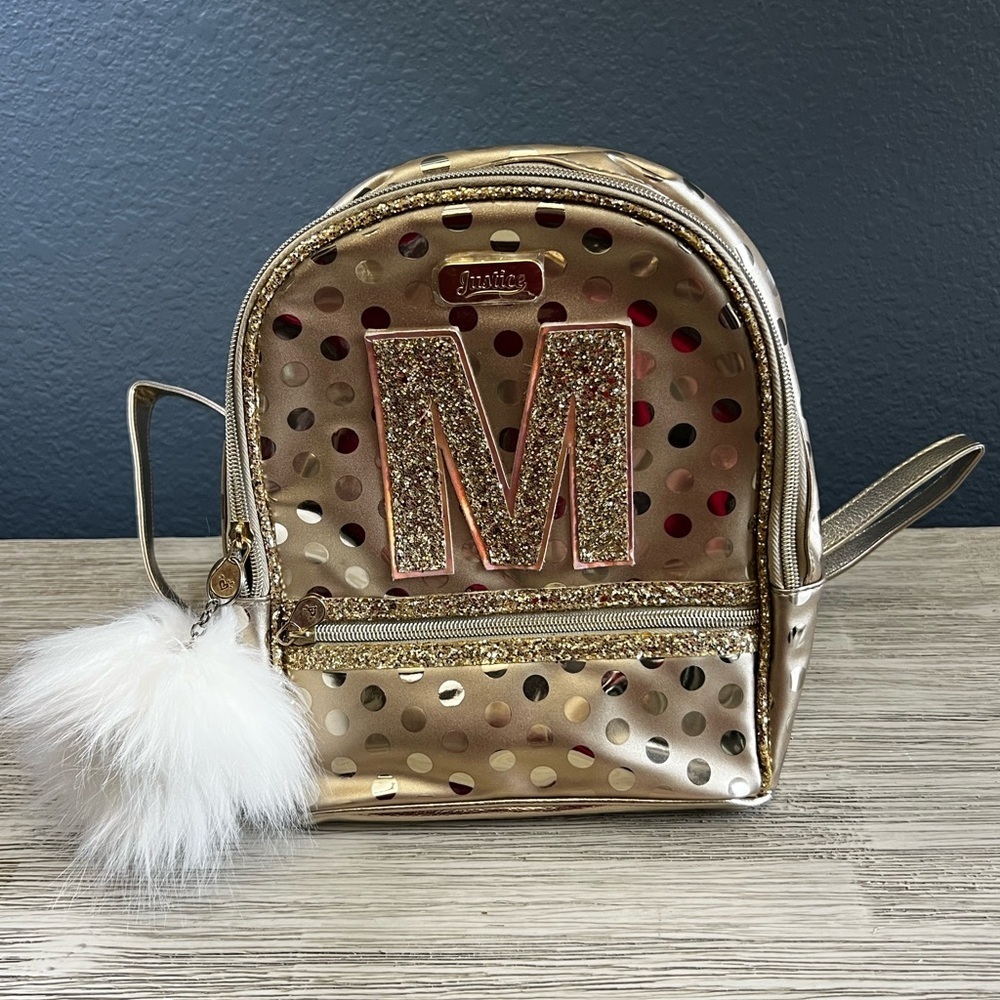 🆕 Justice Gold Backpack with Glitter Initial and Fur Pom Pom Charm